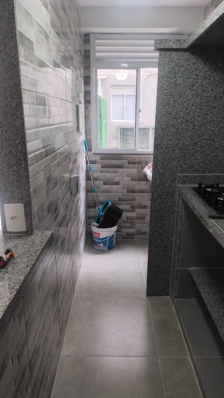 2-bedroom apartment in a building with a pool — photo 14