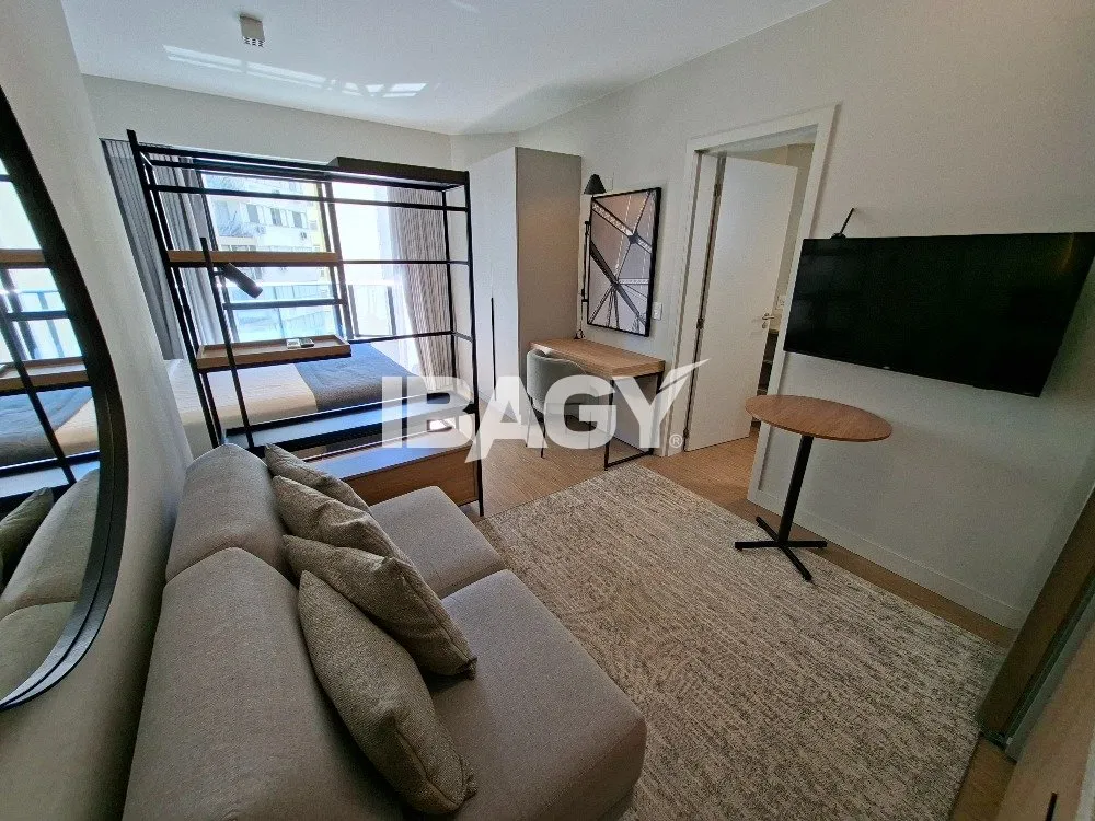 Studio with a glassed-in balcony and open-plan kitchen — photo 30