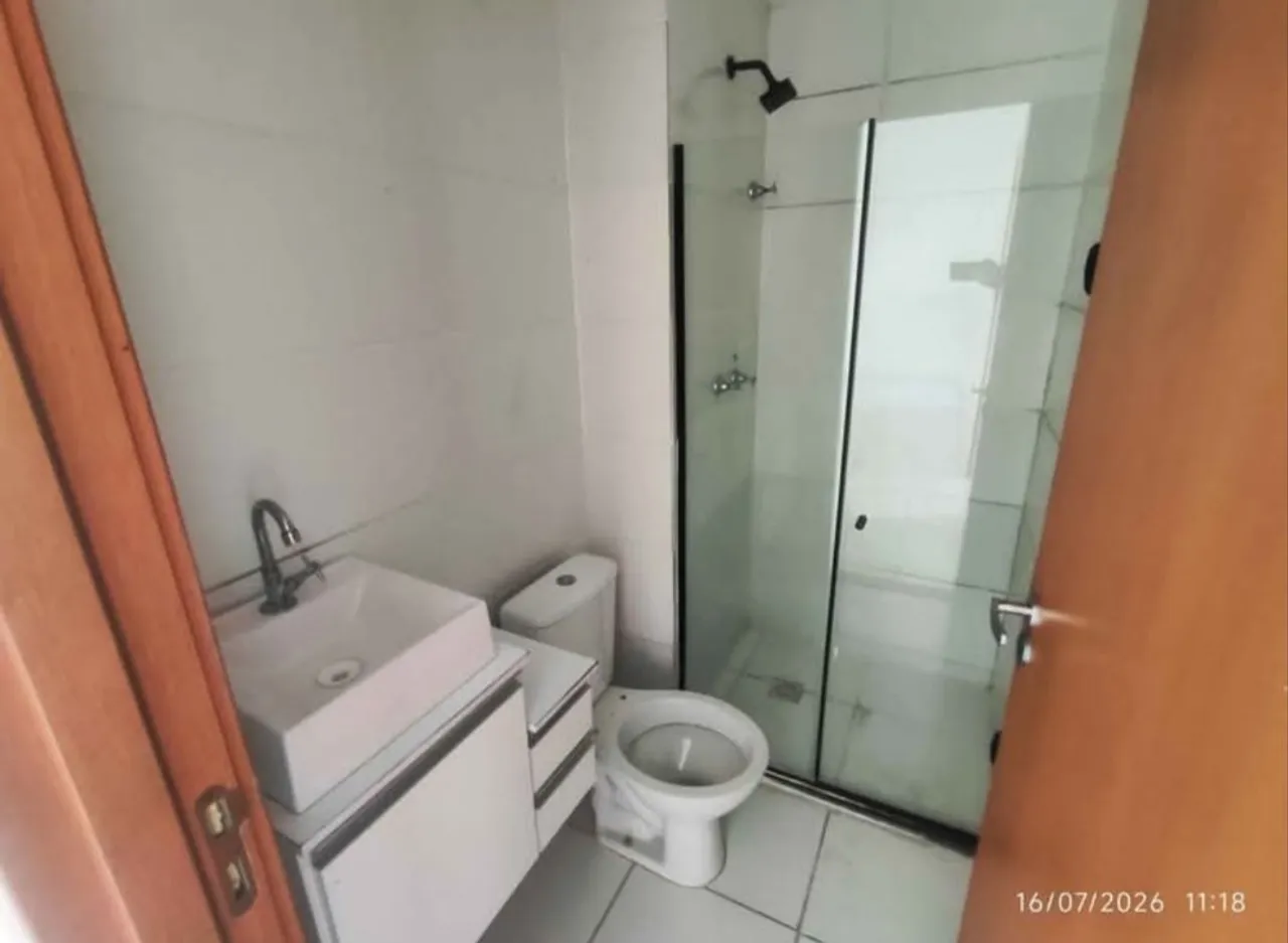 2-bedroom apartment in a building with a pool — photo 13
