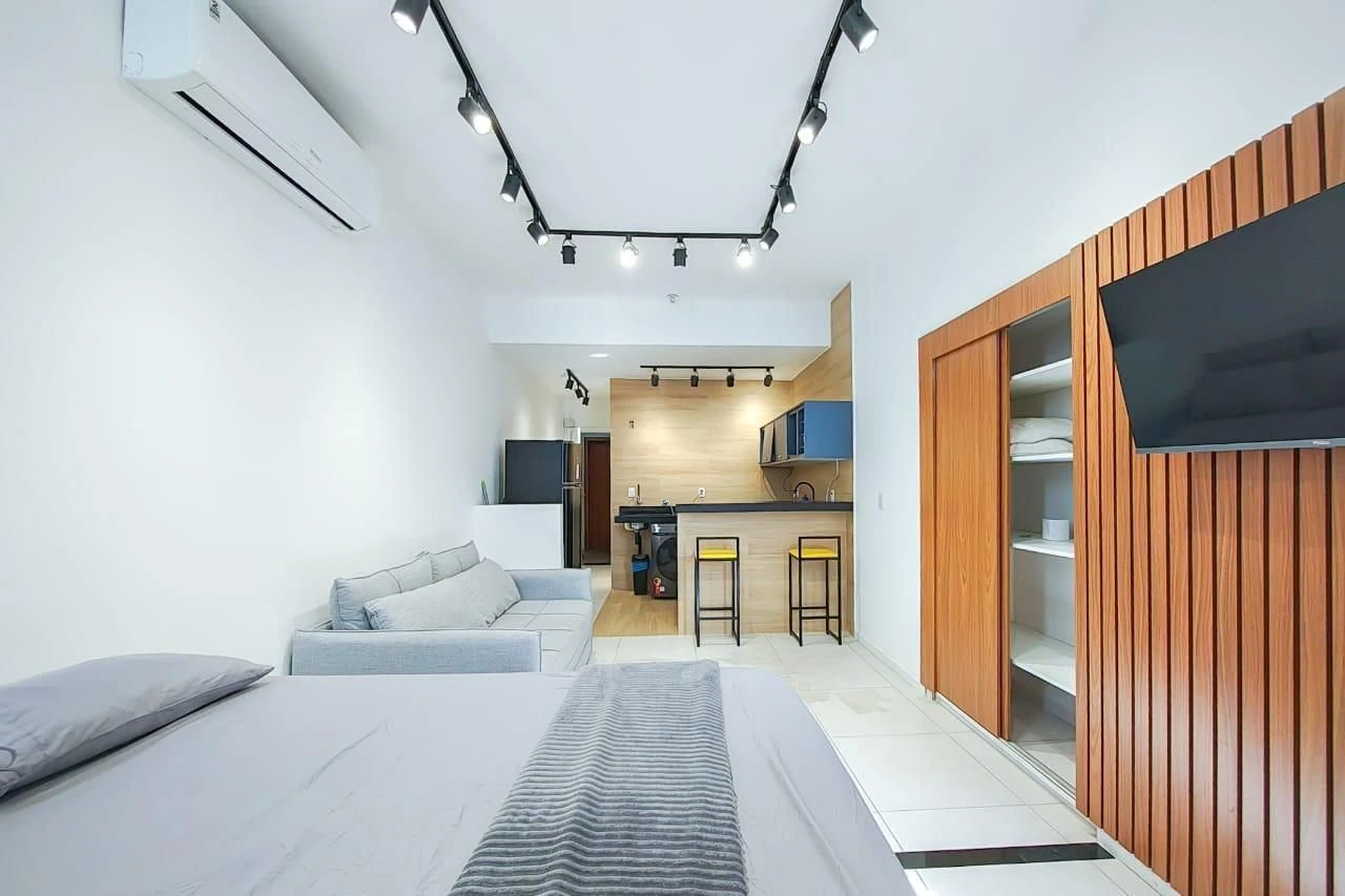 Studio de 40 m² com espaço de home office e máquina de lavar