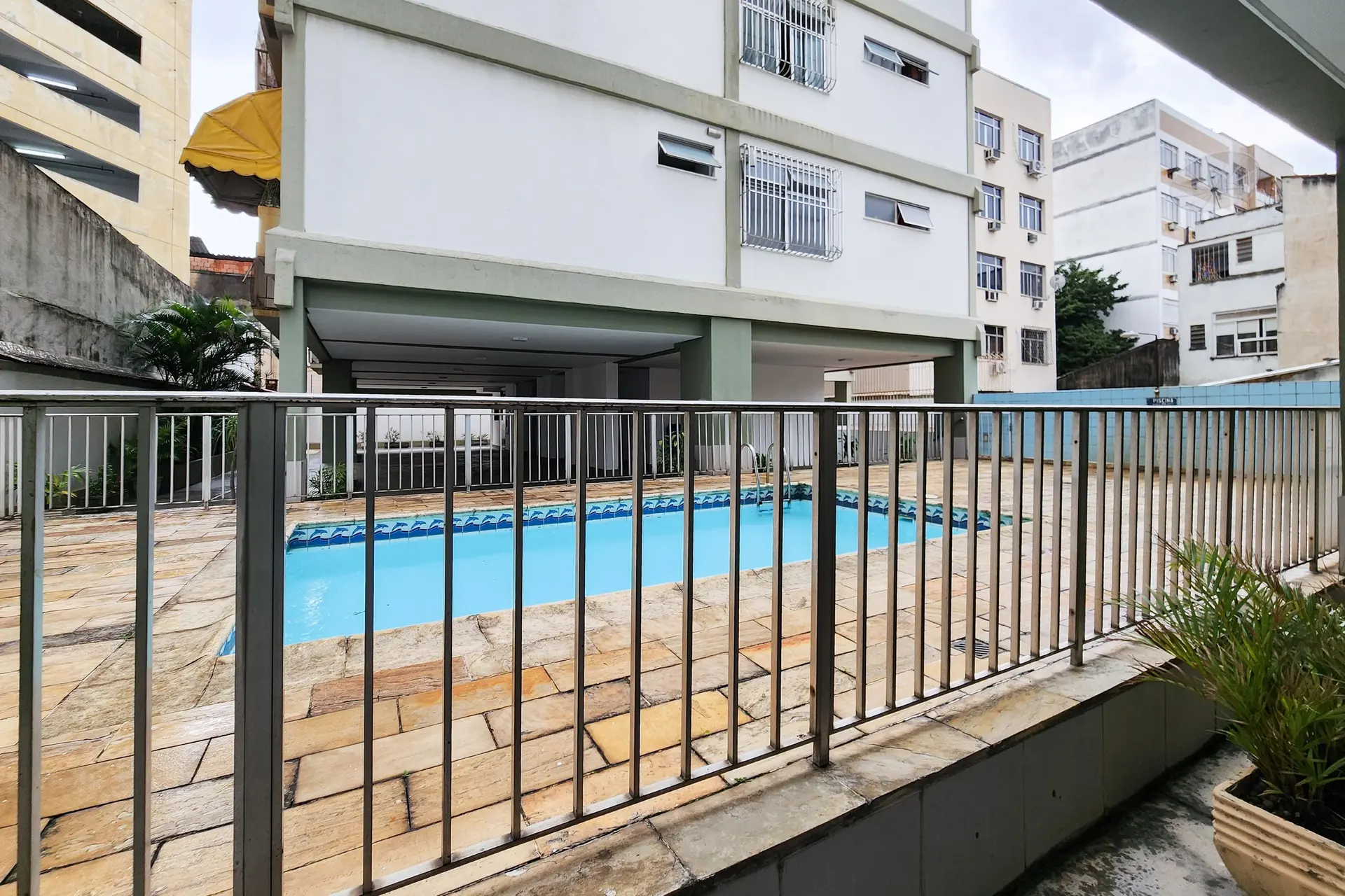 2-bedroom apartment in a building with a pool — photo 19