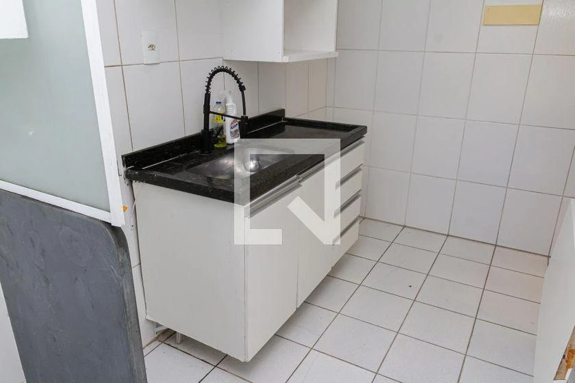 2-bedroom apartment in a building with a pool — photo 13