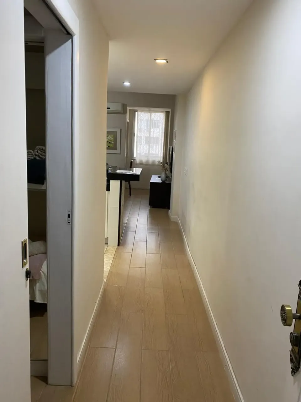 Furnished apartment with glass shower and electric showerhead — photo 14