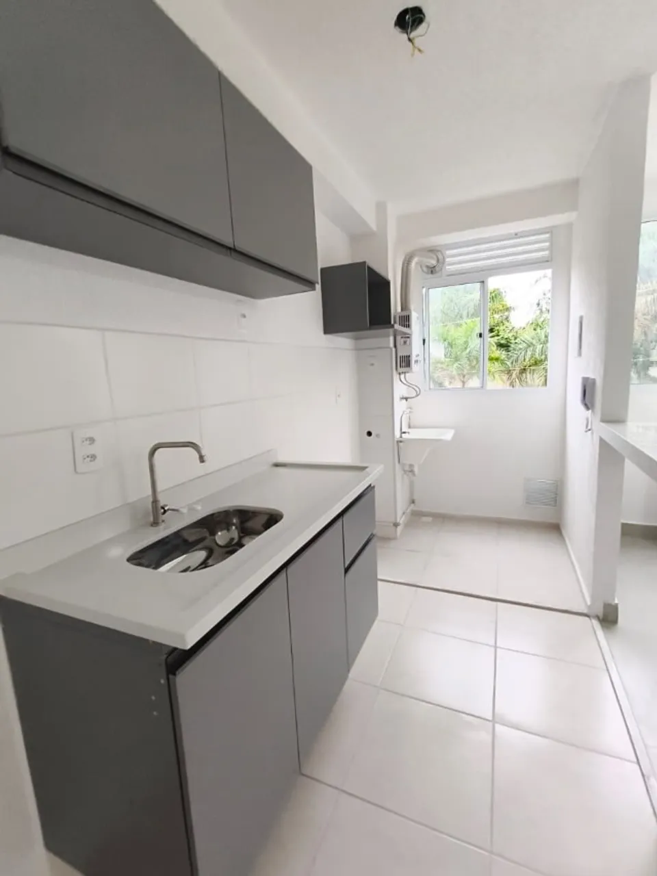 2-bedroom apartment in a building with a pool — photo 13