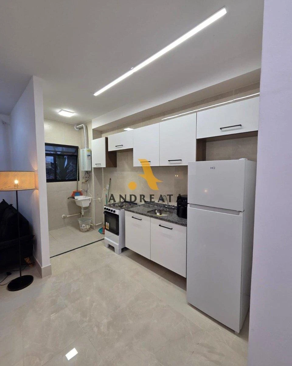 2-bedroom apartment in a building with a gym