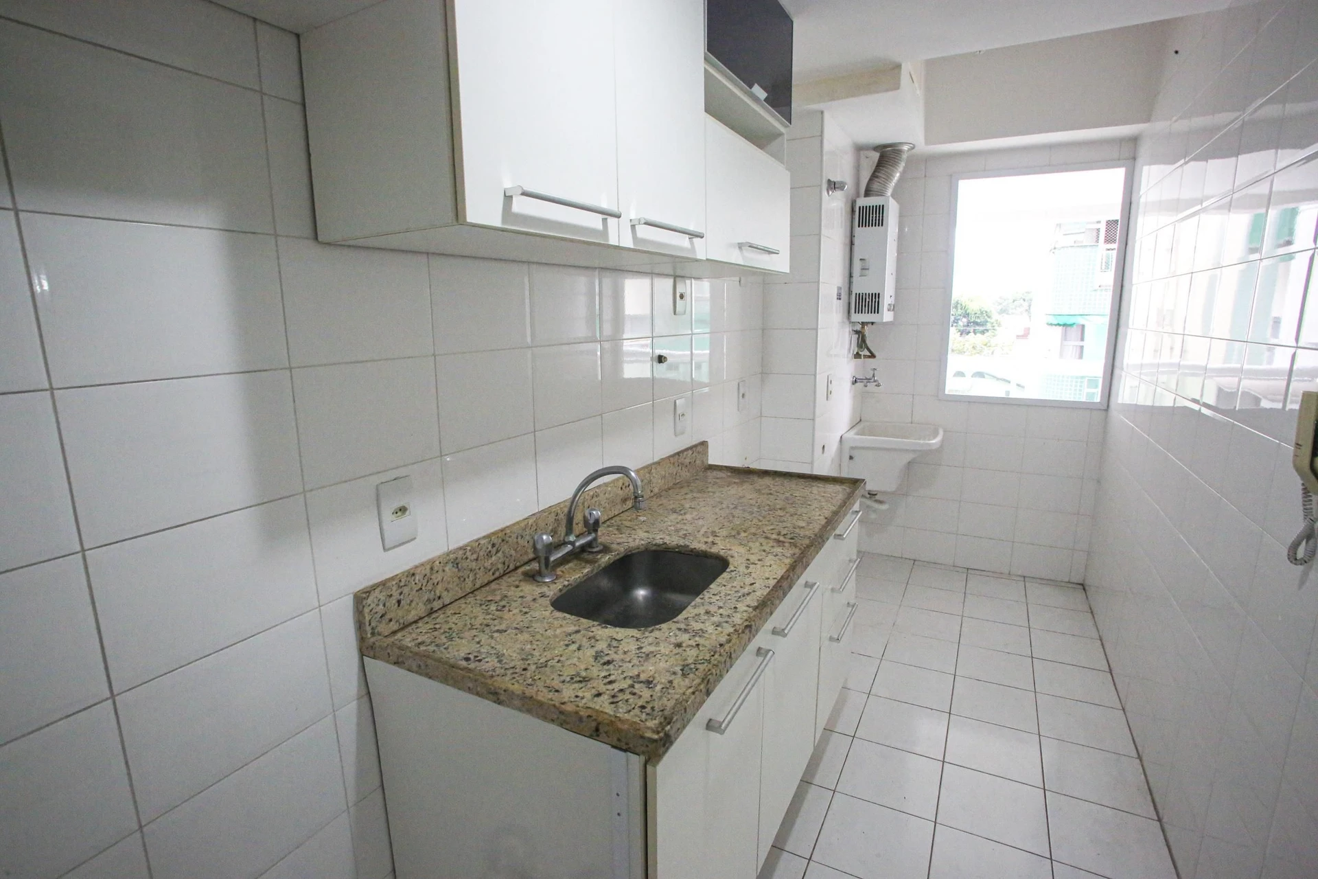 Balcony with a grill in a 2-bedroom apartment, 60 m² — photo 15