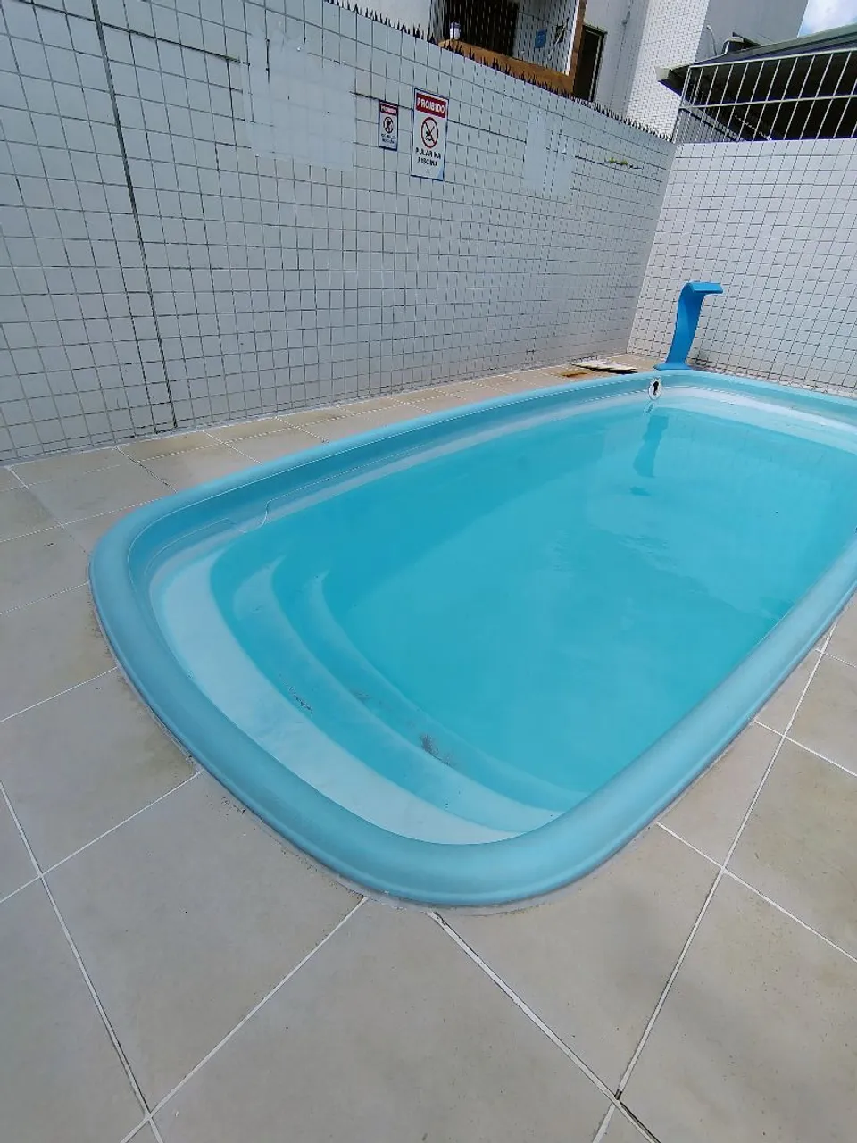 2-bedroom apartment in a building with a pool — photo 7
