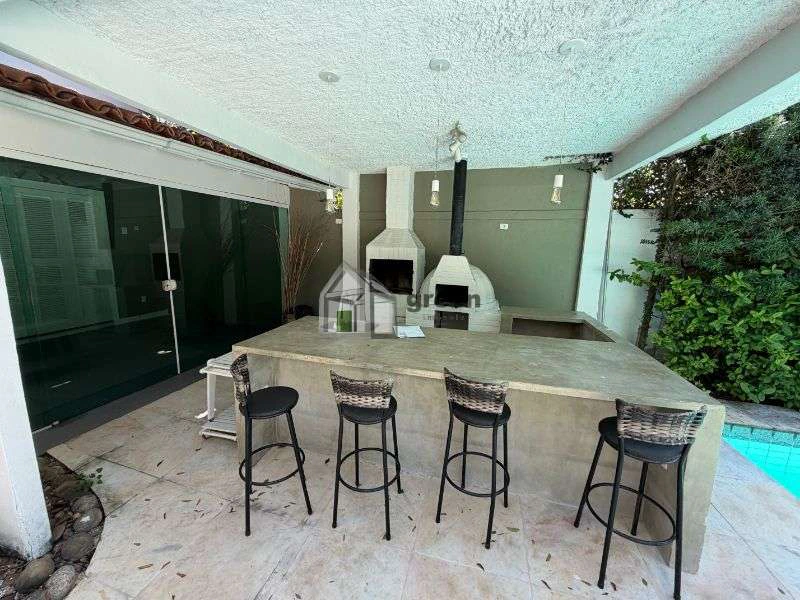 Casa em condomínio com 6 quartos e 600 m² — photo 4