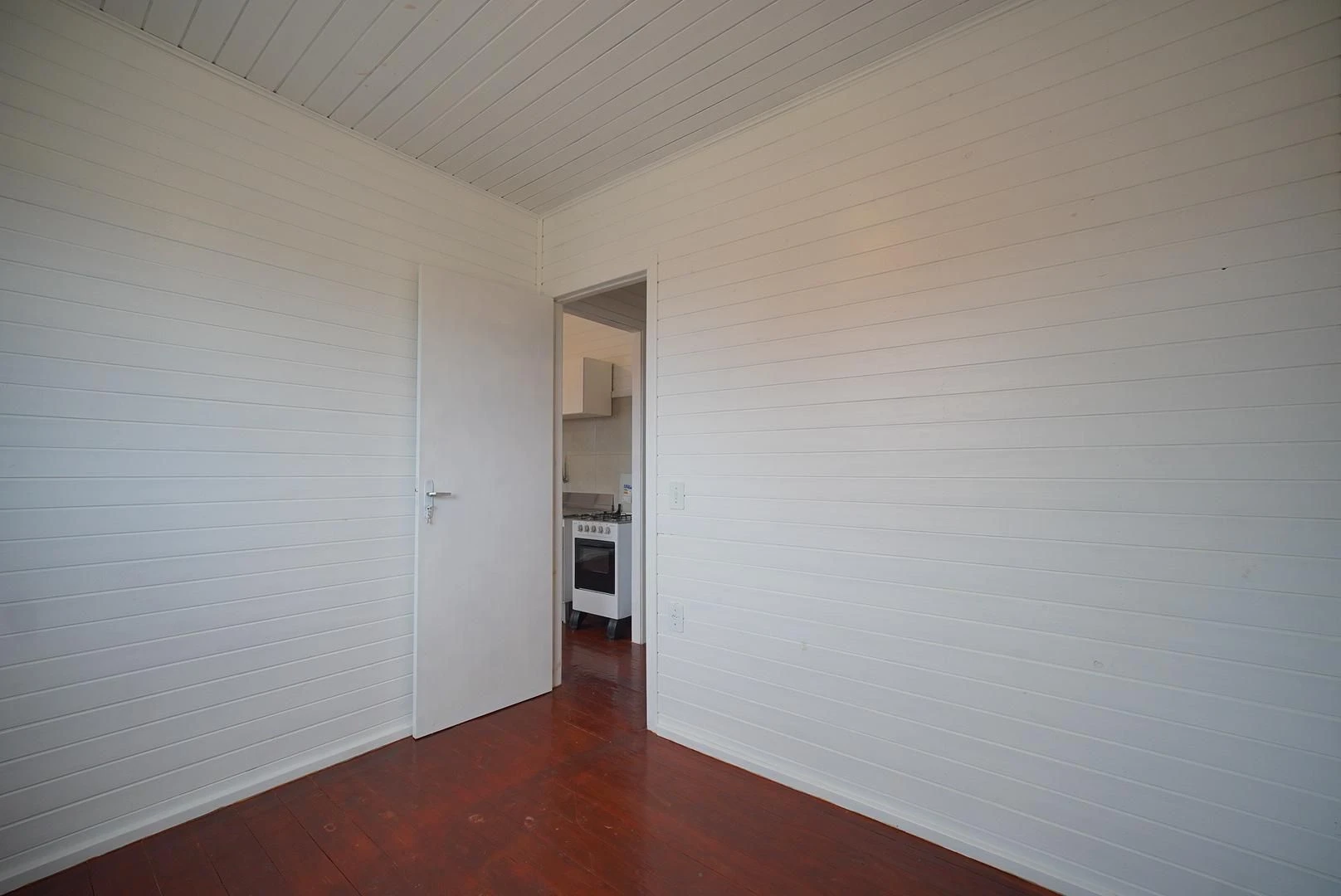 Wood or laminate floors in a one-bedroom house, 24 m² — photo 13