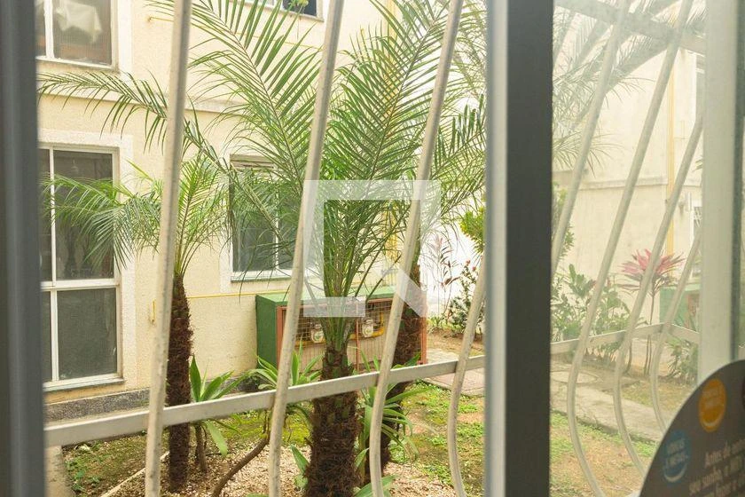 2-bedroom apartment in a building with a pool — photo 19