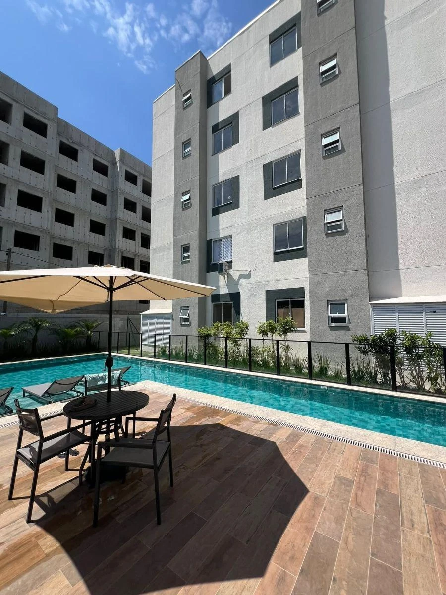 2-bedroom apartment in a building with a pool — photo 7