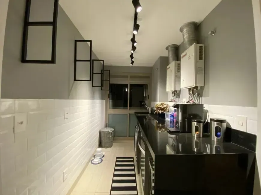 Furnished apartment with 4 bedrooms and an open kitchen — photo 25