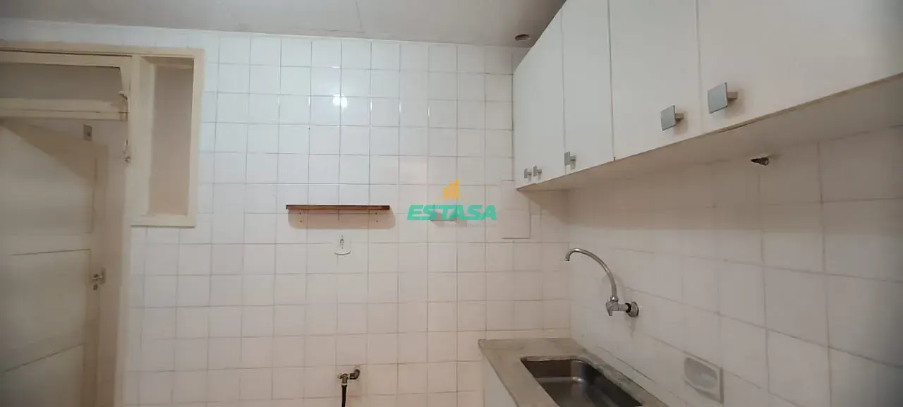 2-bedroom apartment in a building with a pool — photo 5