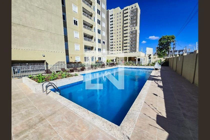 2-bedroom apartment in a building with a pool — photo 18
