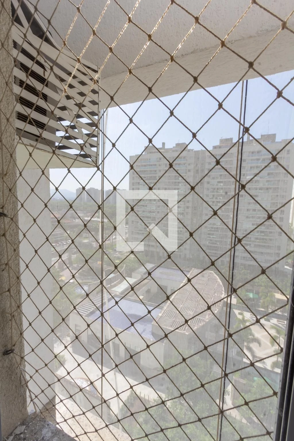 Balcony with a grill in a 2-bedroom apartment, 68 m² — photo 2