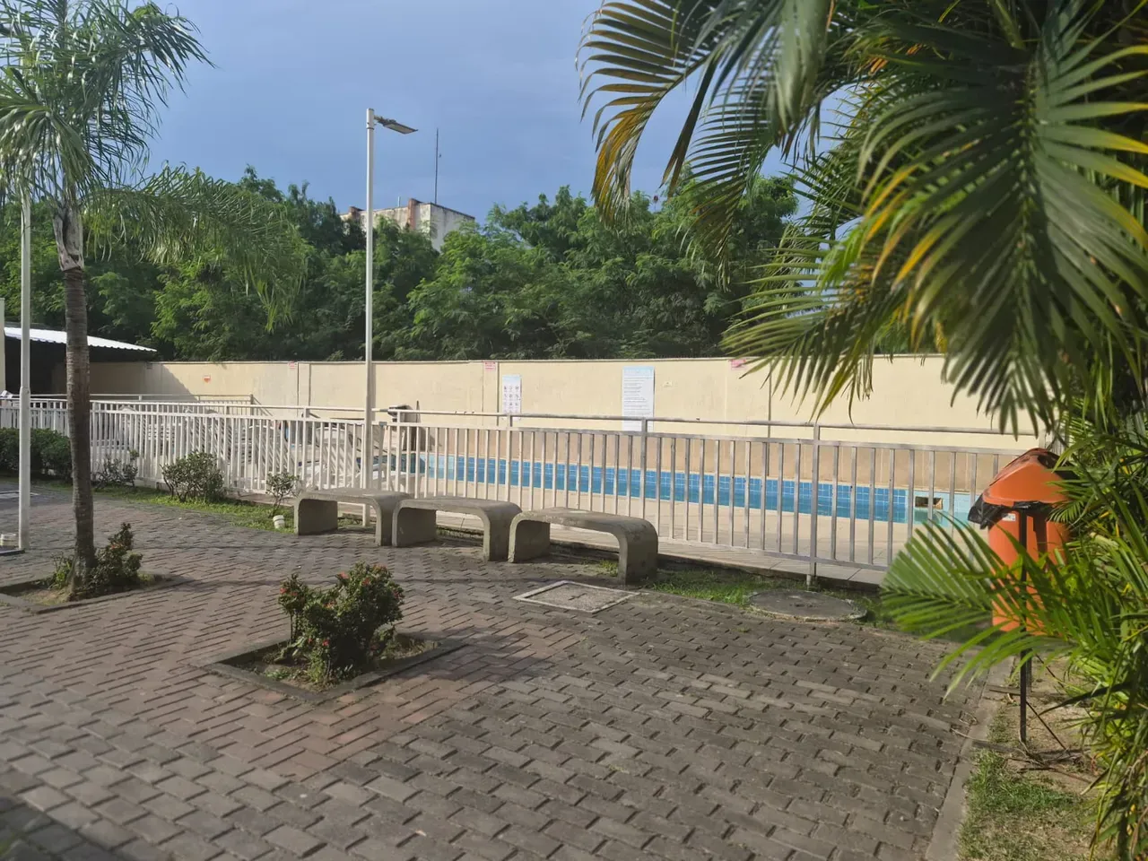 2-bedroom apartment in a building with a pool — photo 26