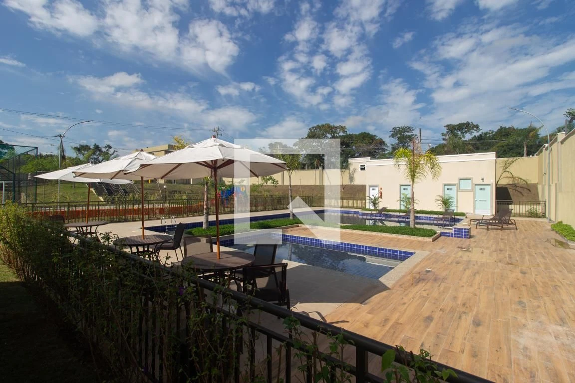 2-bedroom apartment in a building with a pool — photo 6