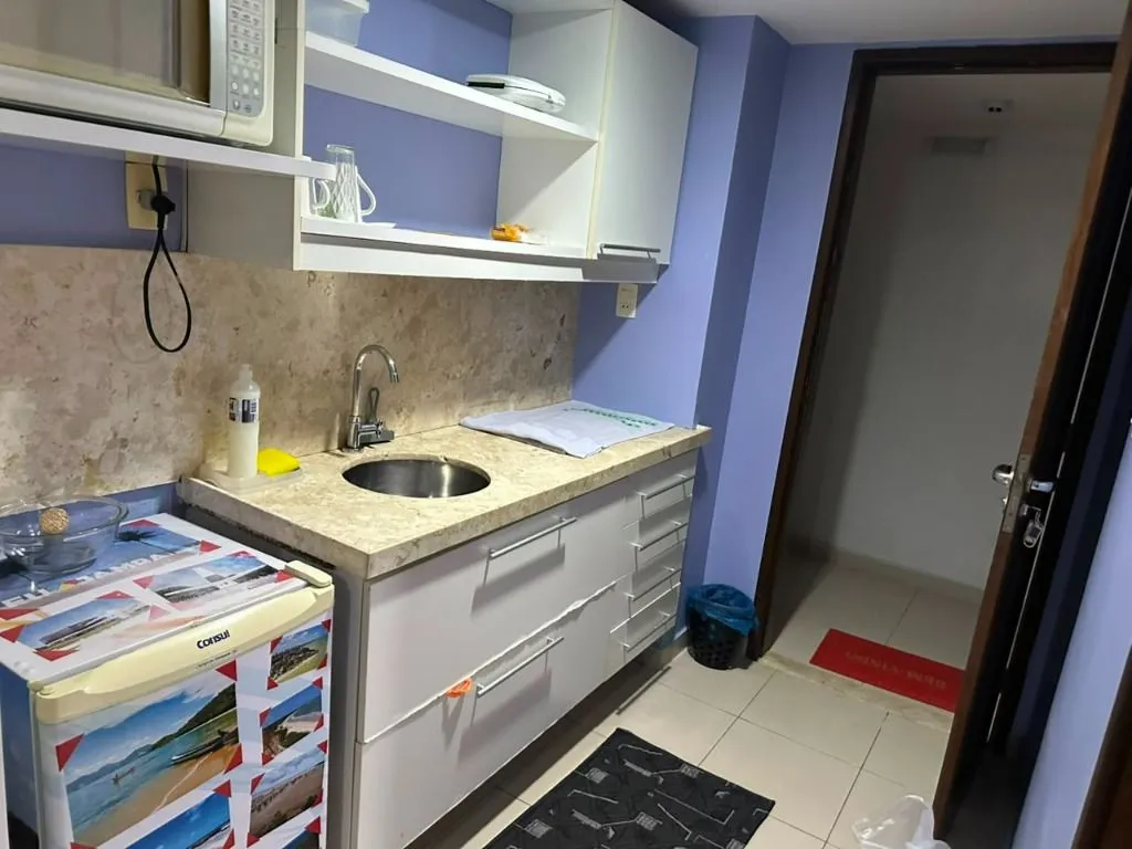 Apartamento de 24 m² com cozinha compacta e 1 dormitório
