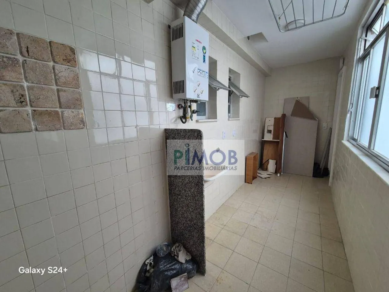 Apartamento de 2 quartos e 104 m² com área de lavanderia — photo 10