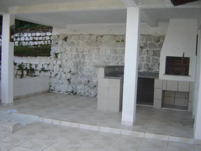 Casa residencial com 3 quartos e bancada na sacada — photo 12