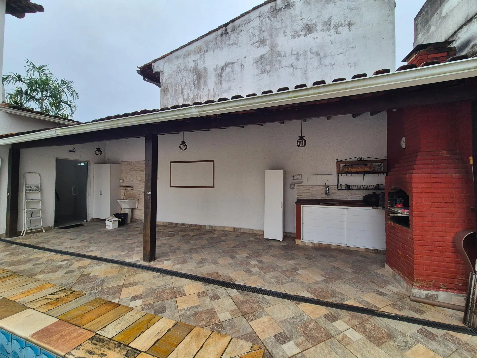 Casa em condomínio com 3 suítes e churrasqueira na varanda — photo 51