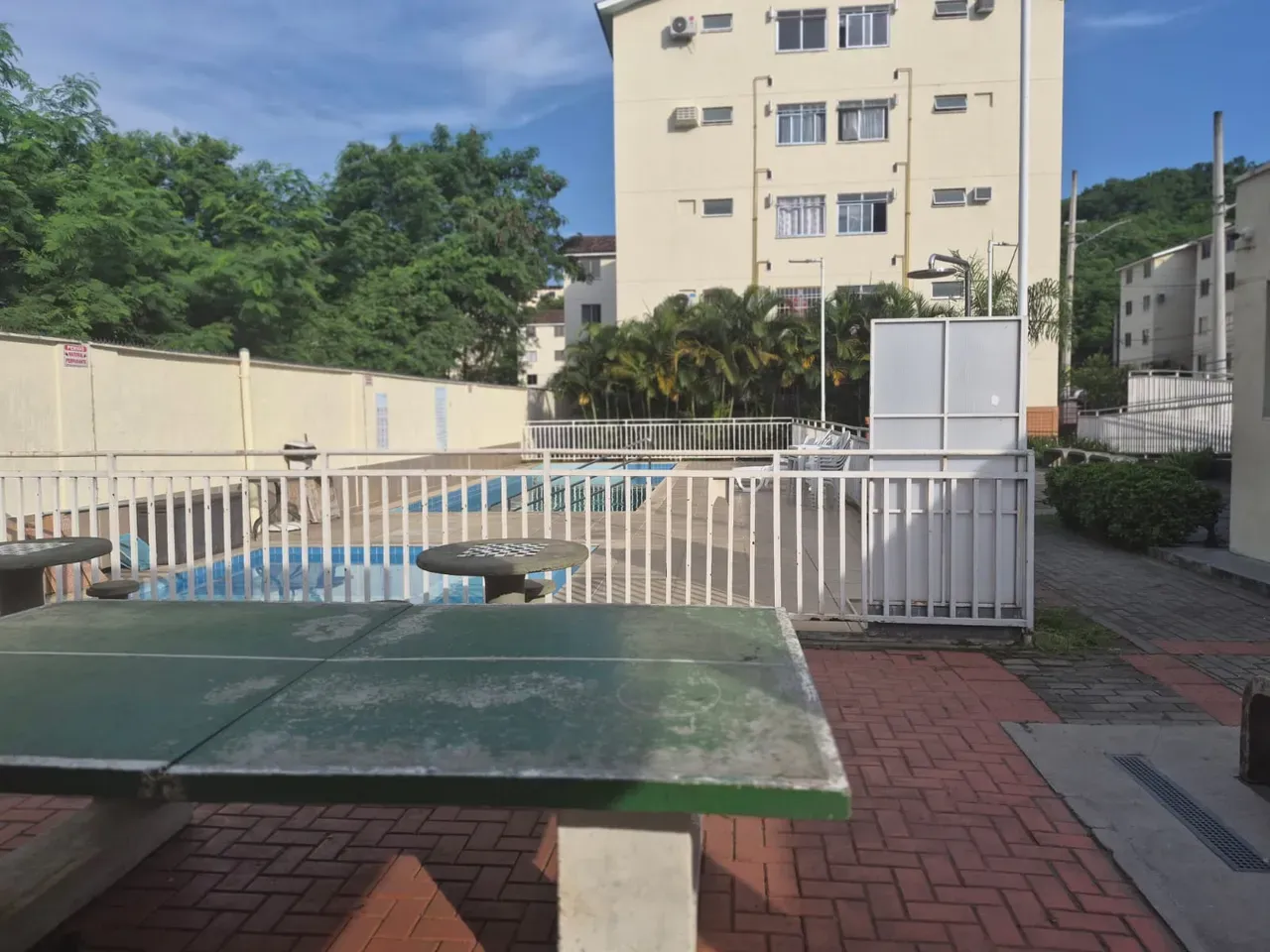 2-bedroom apartment in a building with a pool