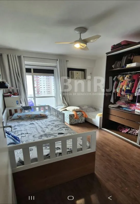 2-bedroom apartment in a building with a pool — photo 4