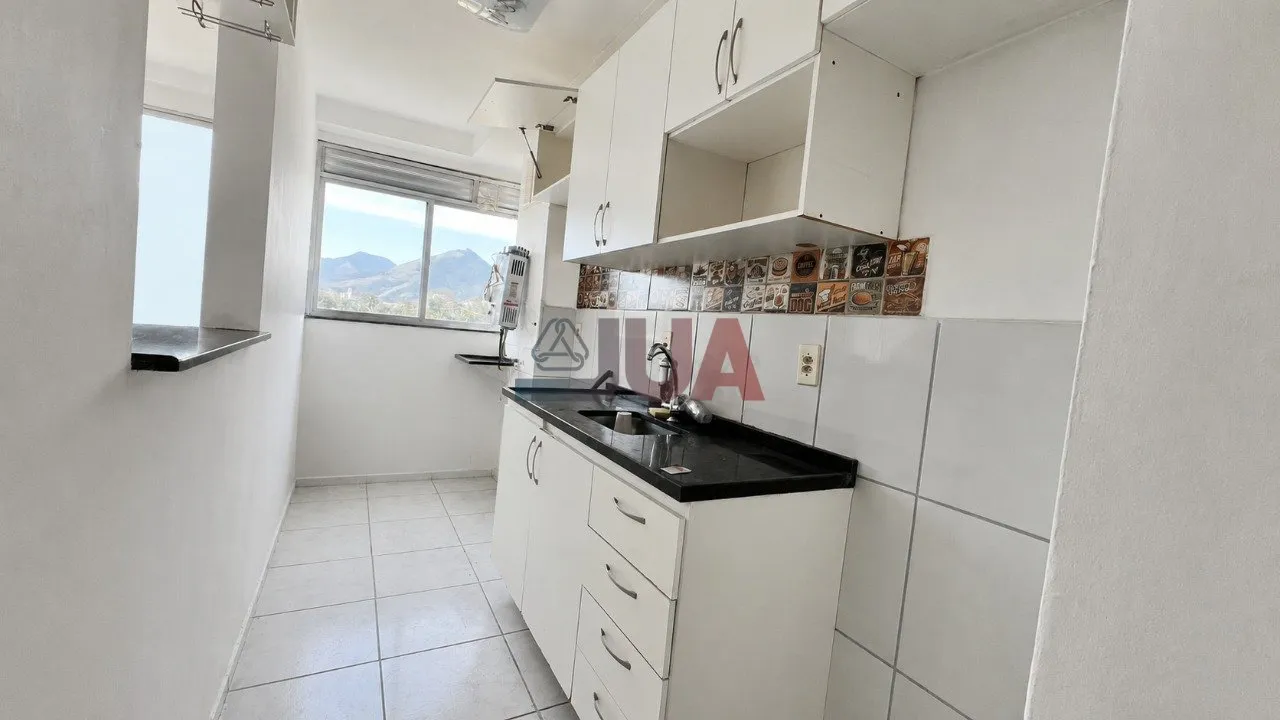 2-bedroom apartment with open-plan kitchen and 1 parking spot — photo 2