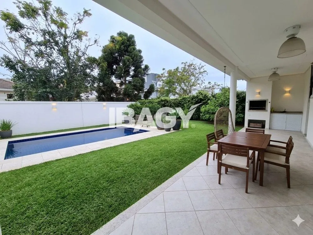 4-bedroom house with 3 suites and 400 m² total area — photo 32