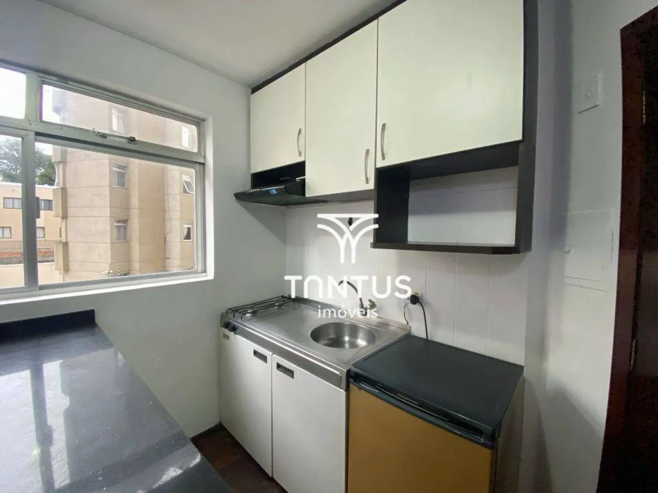 1-bedroom 24 m² apartment with a compact kitchen corner — photo 6