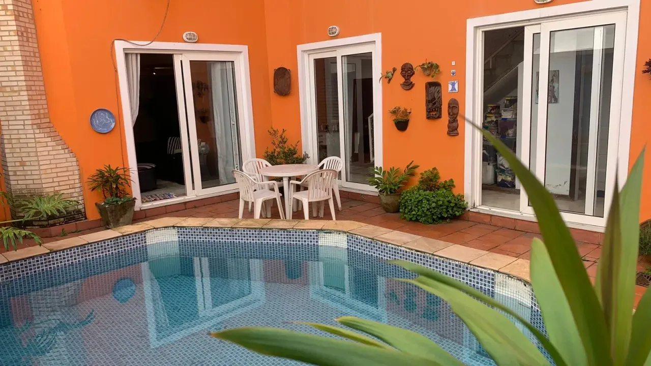Casa com 4 dormitórios e 5 banheiros, com 3 vagas — photo 9