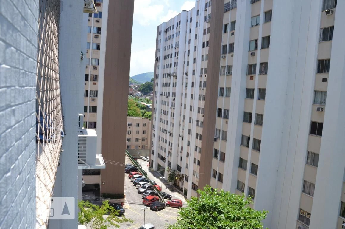 2-bedroom apartment in a building with a pool — photo 13