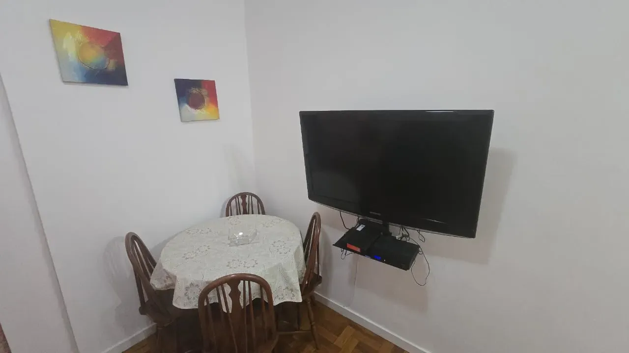 One-bedroom apartment with wood or laminate floors — photo 16