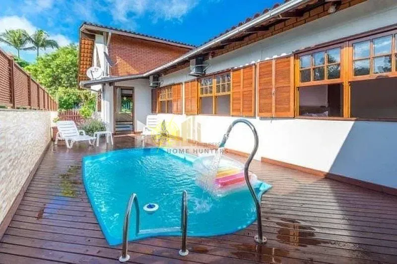 Casa com 4 dormitórios, 2 suítes e churrasqueira na varanda — photo 7