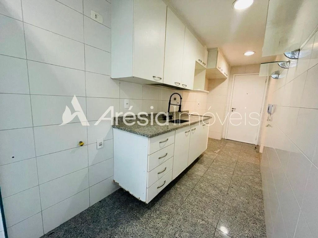 2-bedroom apartment in a building with a pool — photo 10