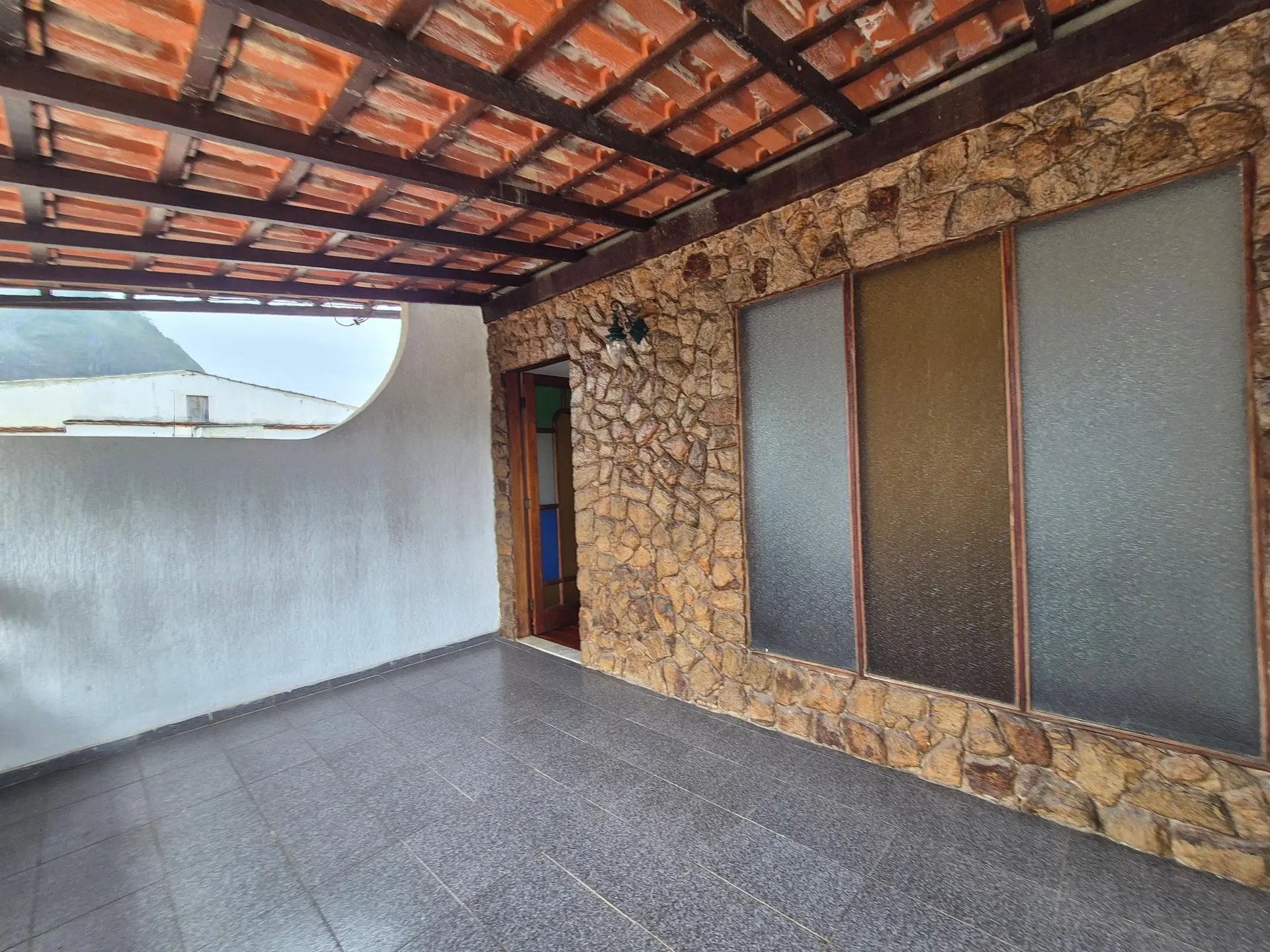 Casa em condomínio com 3 suítes e churrasqueira na varanda — photo 47