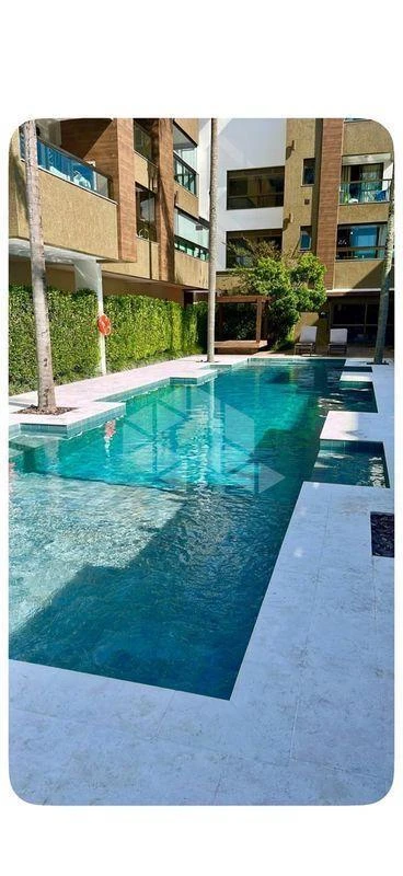3-bedroom apartment in a building with a pool — photo 6