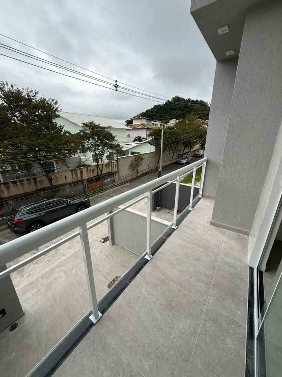 Casa com cozinha americana e varanda, 2 quartos — photo 2