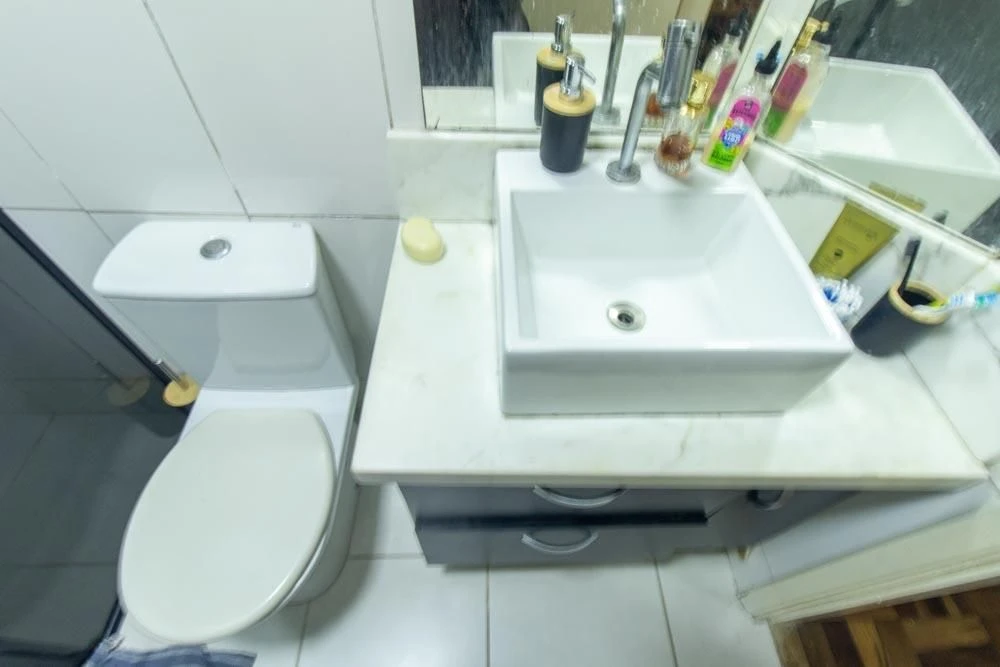 Furnished 2-bedroom apartment with desk workspace corner — photo 18