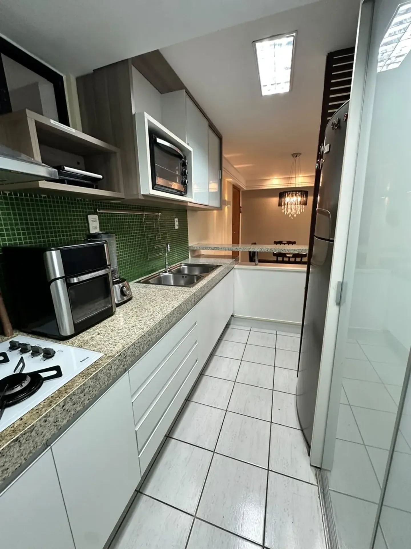 Apartamento mobiliado com cozinha americana e varanda — photo 12