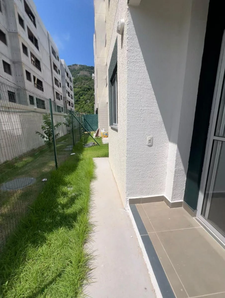 2-bedroom apartment in a building with a pool — photo 16