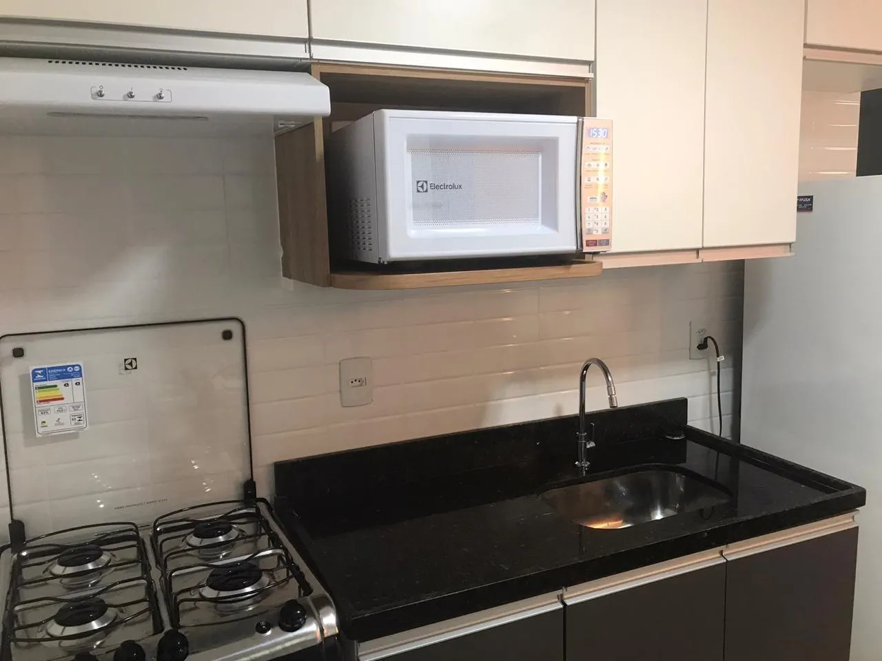 Furnished studio-style apartment with open-plan kitchen — photo 2