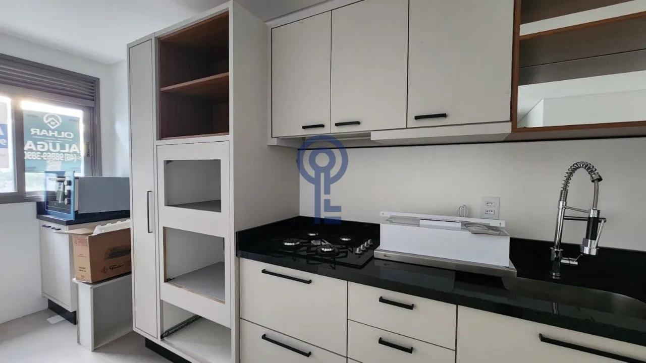 Furnished 59 m² studio with open-plan kitchen and electric stove — photo 4