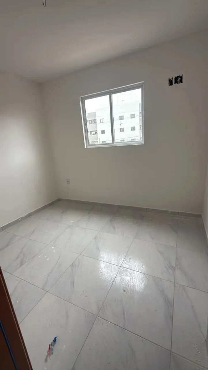 2-bedroom apartment in a building with a pool — photo 3
