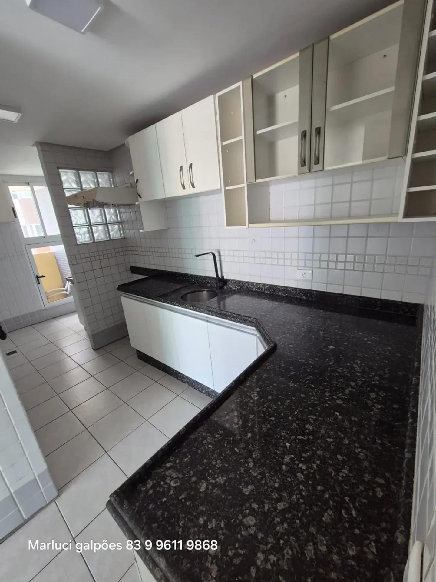 2-bedroom apartment in a building with a pool — photo 2