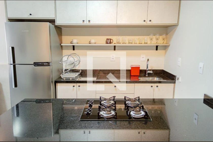 Furnished studio kitnet with kitchen-dining open plan — photo 15