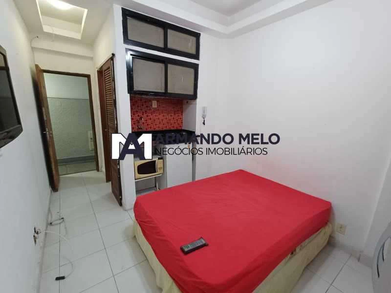 Unfurnished studio with fitted kitchen cabinets and 1 bath