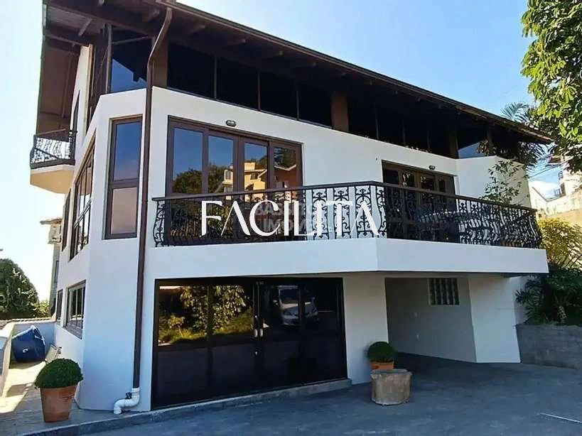 Casa com 4 suítes e 6 vagas, 473 m² com churrasqueia — photo 2