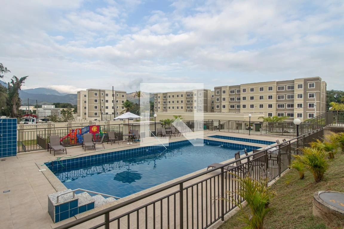 2-bedroom apartment in a building with a pool — photo 45
