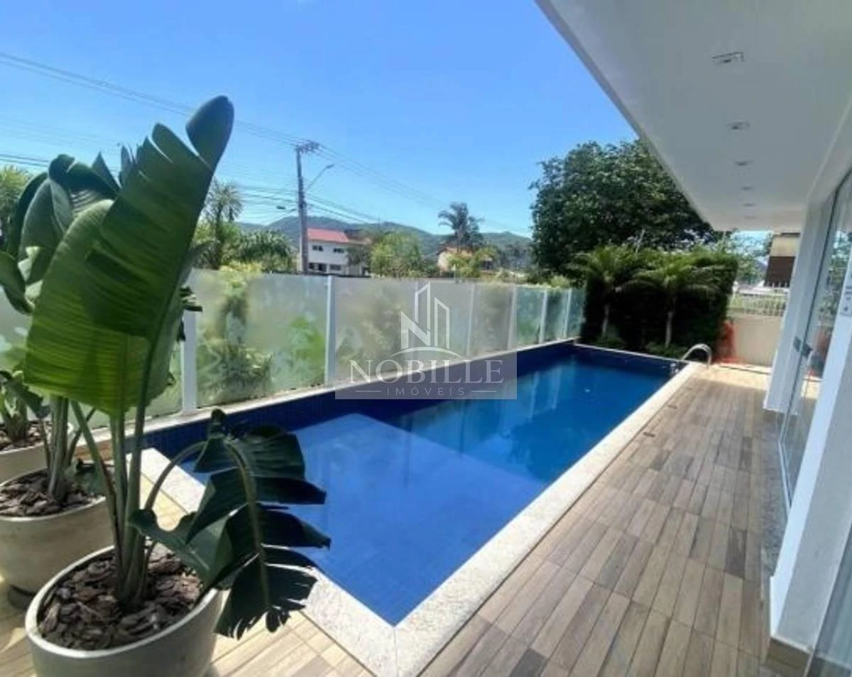 2-bedroom apartment in a building with a pool — photo 24